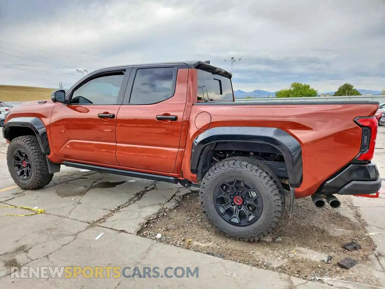 2 Photograph of a damaged car 3TYLC5LN4RT014149 TOYOTA TACOMA 2024