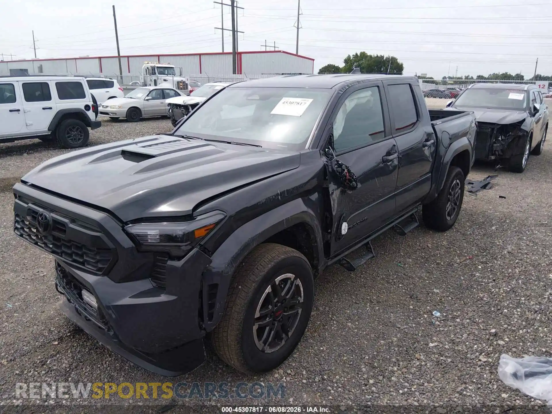 2 Photograph of a damaged car 3TMKB5FN7TM063942 TOYOTA TACOMA 2026