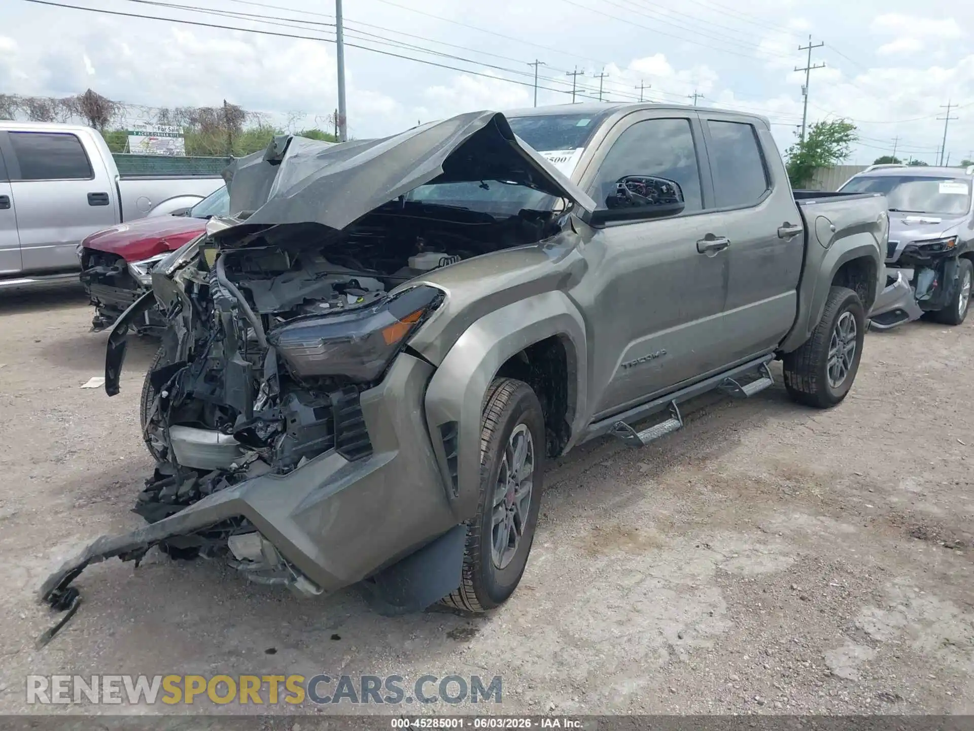 2 fotografías del automóvil dañado 3TMKB5FN8TM061763 TOYOTA TACOMA 2026