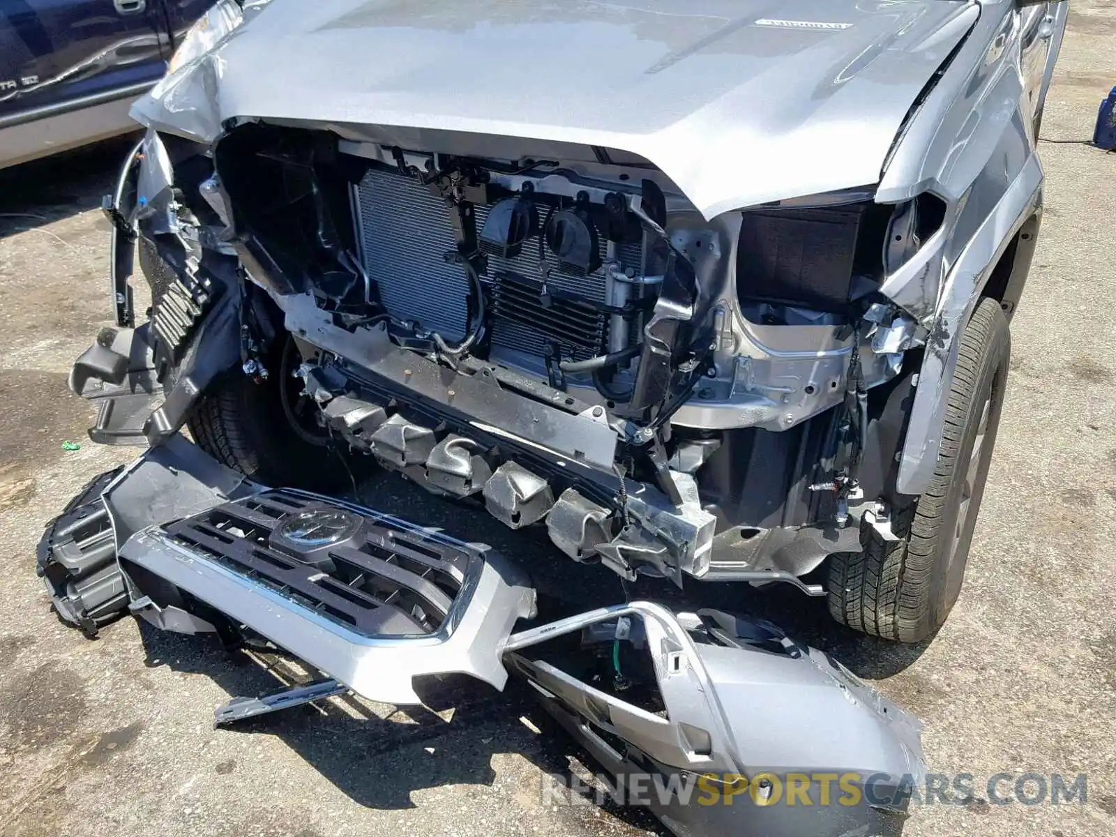 9 Photograph of a damaged car 3TMAZ5CN1KM094825 TOYOTA TACOMA DOU 2019
