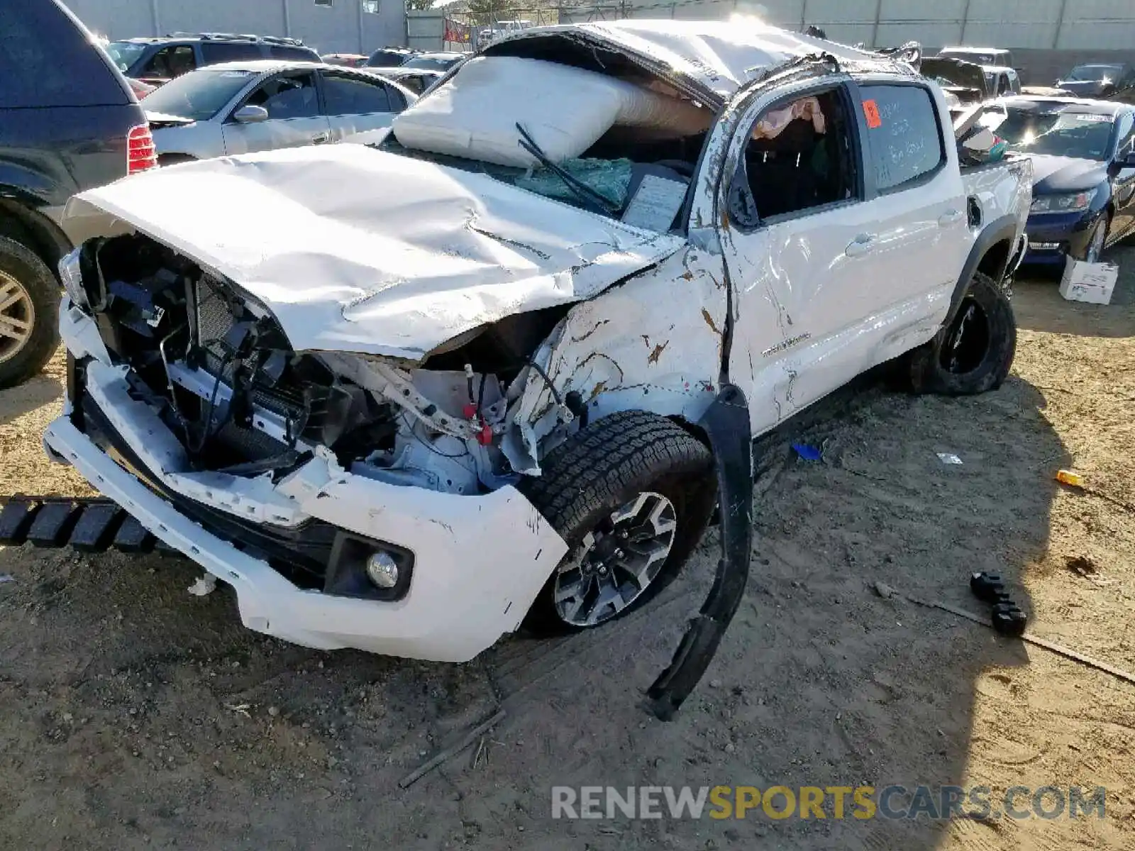 2 Photograph of a damaged car 3TMCZ5AN2KM237647 TOYOTA TACOMA DOU 2019