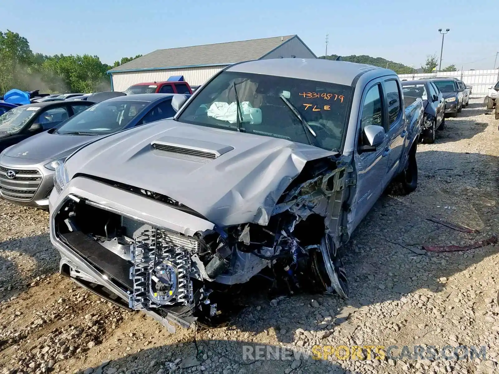 2 Photograph of a damaged car 3TMCZ5AN2KM262029 TOYOTA TACOMA DOU 2019
