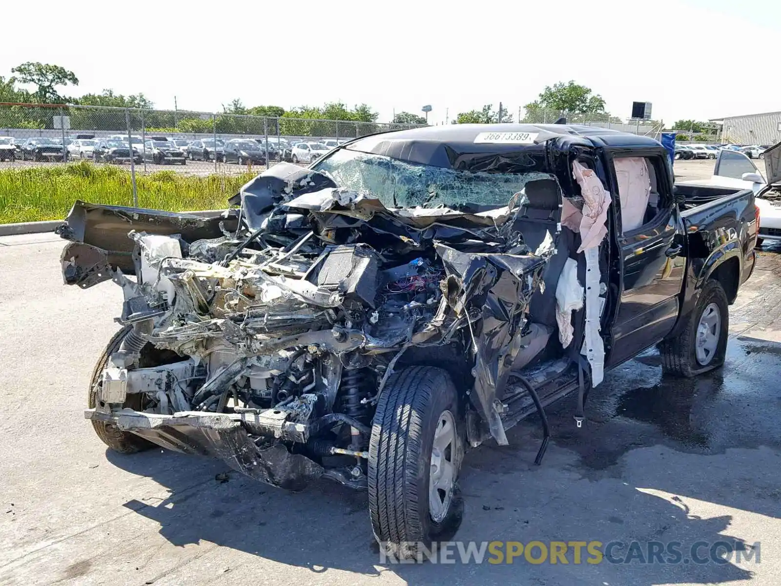 2 Photograph of a damaged car 5TFAX5GN1KX135836 TOYOTA TACOMA DOU 2019