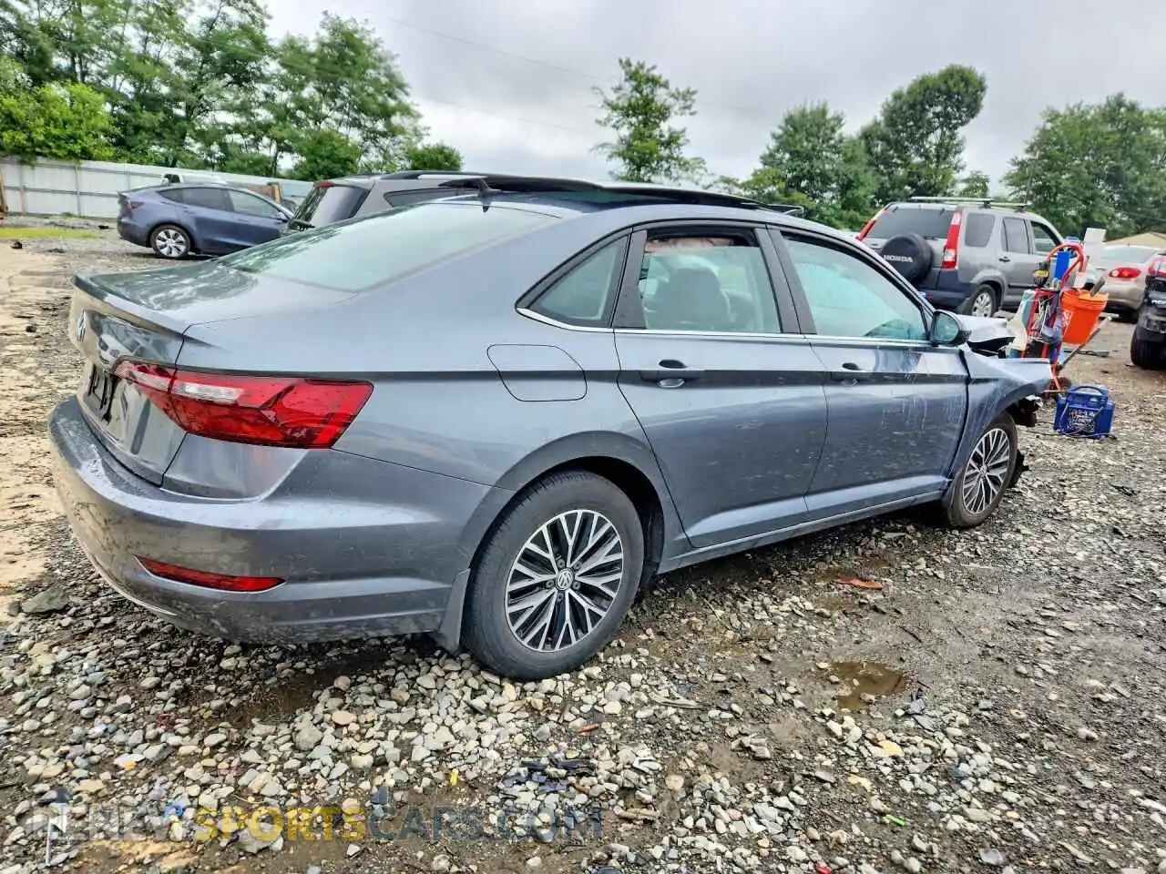 3 fotografías del automóvil dañado 3VWC57BU8MM099285 VOLKSWAGEN JETTA 2021