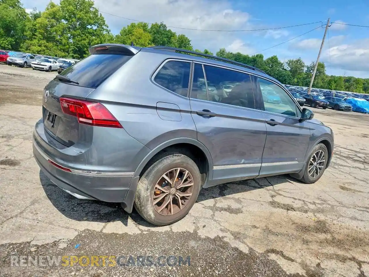 3 fotografías del automóvil dañado 3VV3B7AX1MM110054 VOLKSWAGEN TIGUAN 2021