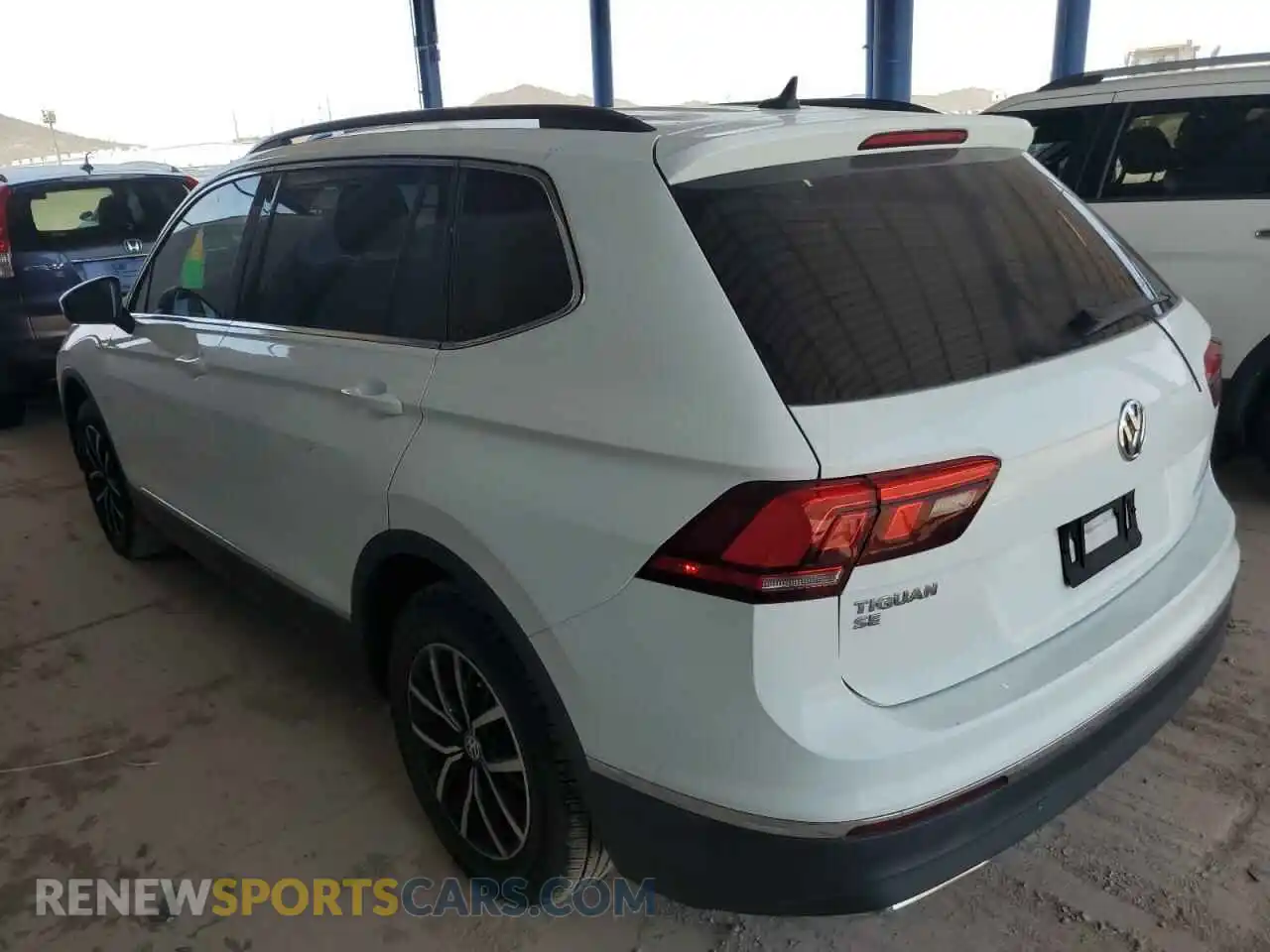 2 fotografías del automóvil dañado 3VV3B7AX5MM010006 VOLKSWAGEN TIGUAN 2021