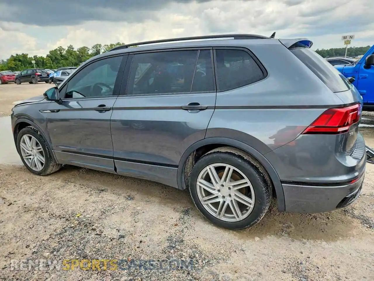 2 fotografías del automóvil dañado 3VVCB7AX1PM045369 VOLKSWAGEN TIGUAN 2023