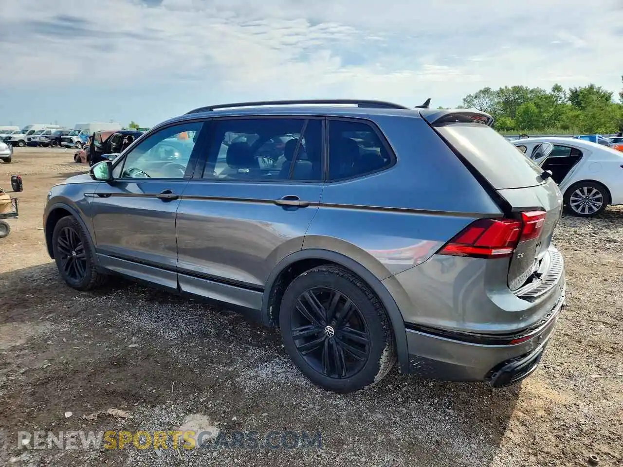 2 fotografías del automóvil dañado 3VVCB7AX4PM142095 VOLKSWAGEN TIGUAN 2023