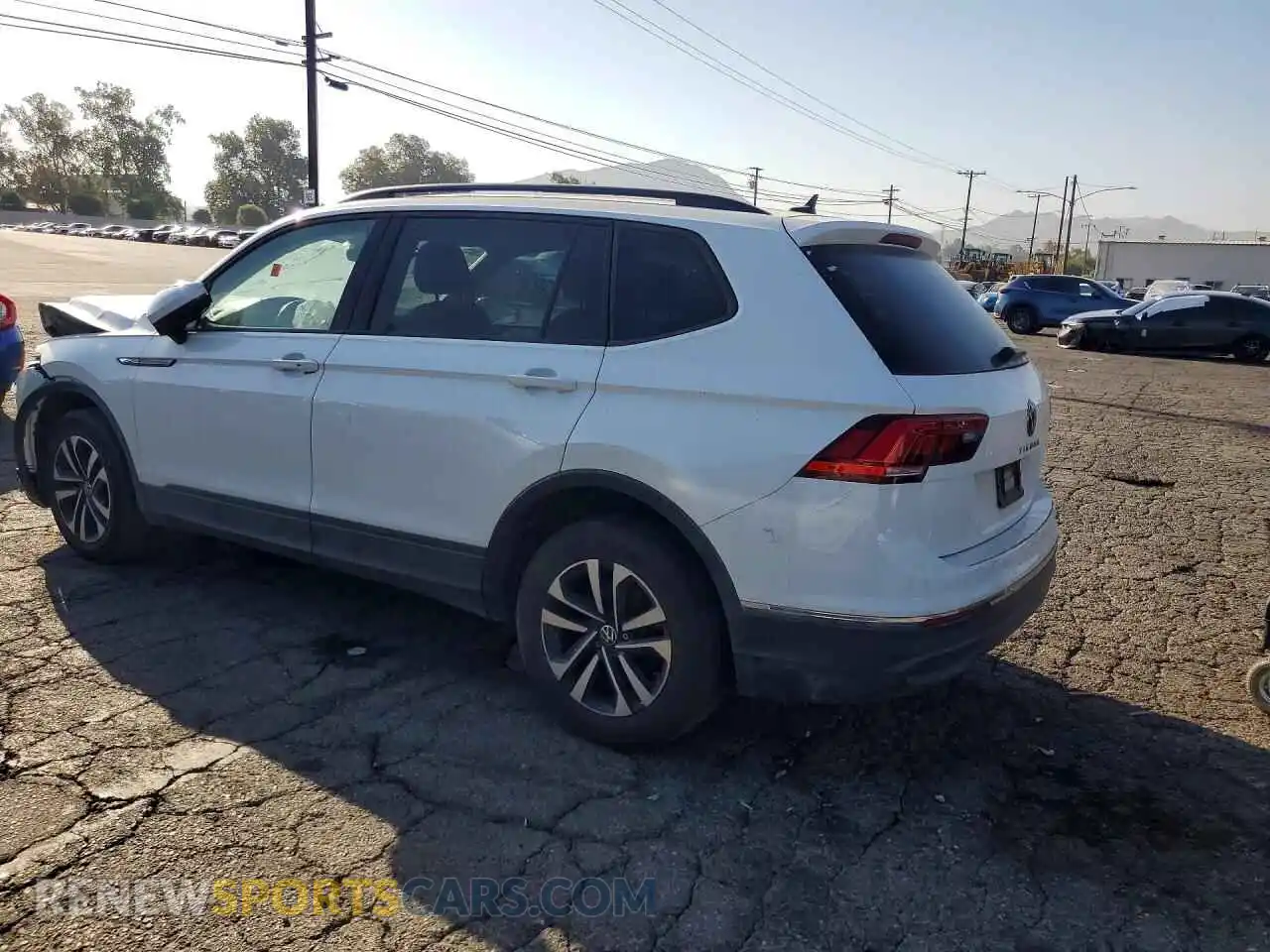 2 fotografías del automóvil dañado 3VVRB7AX2PM065348 VOLKSWAGEN TIGUAN 2023