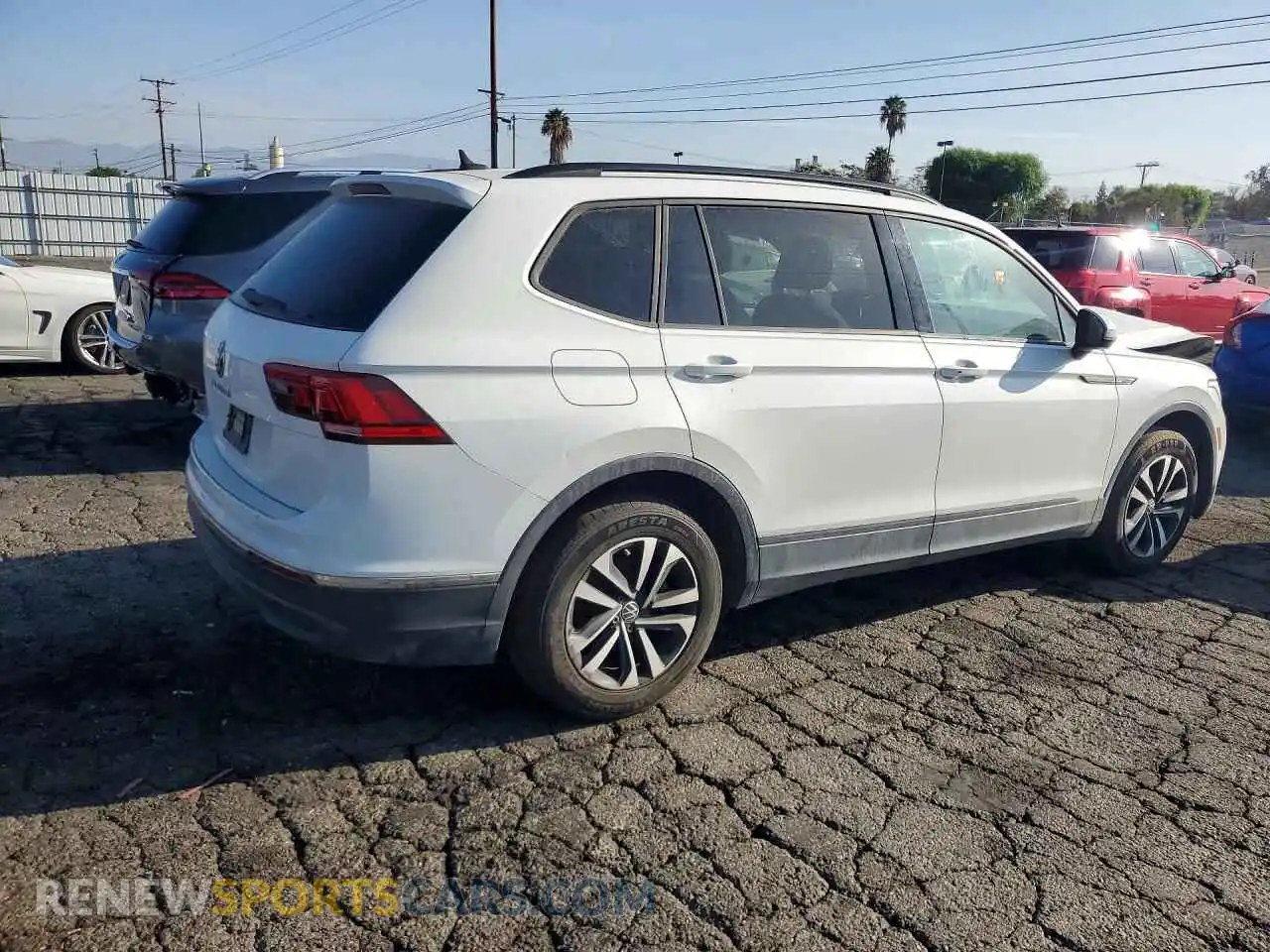 3 fotografías del automóvil dañado 3VVRB7AX2PM065348 VOLKSWAGEN TIGUAN 2023