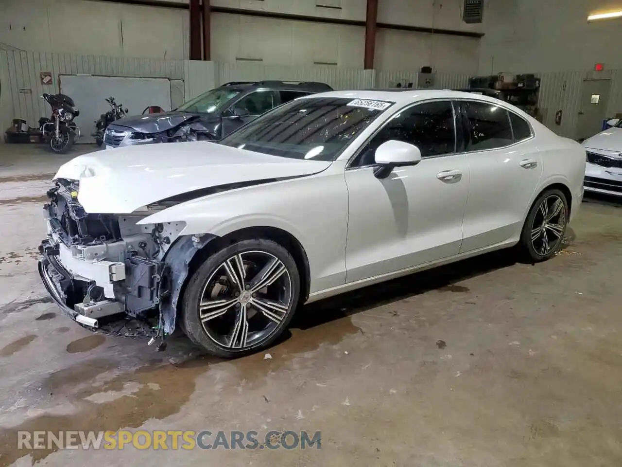 1 Photograph of a damaged car 7JR102TL0MG112303 VOLVO S60 2021