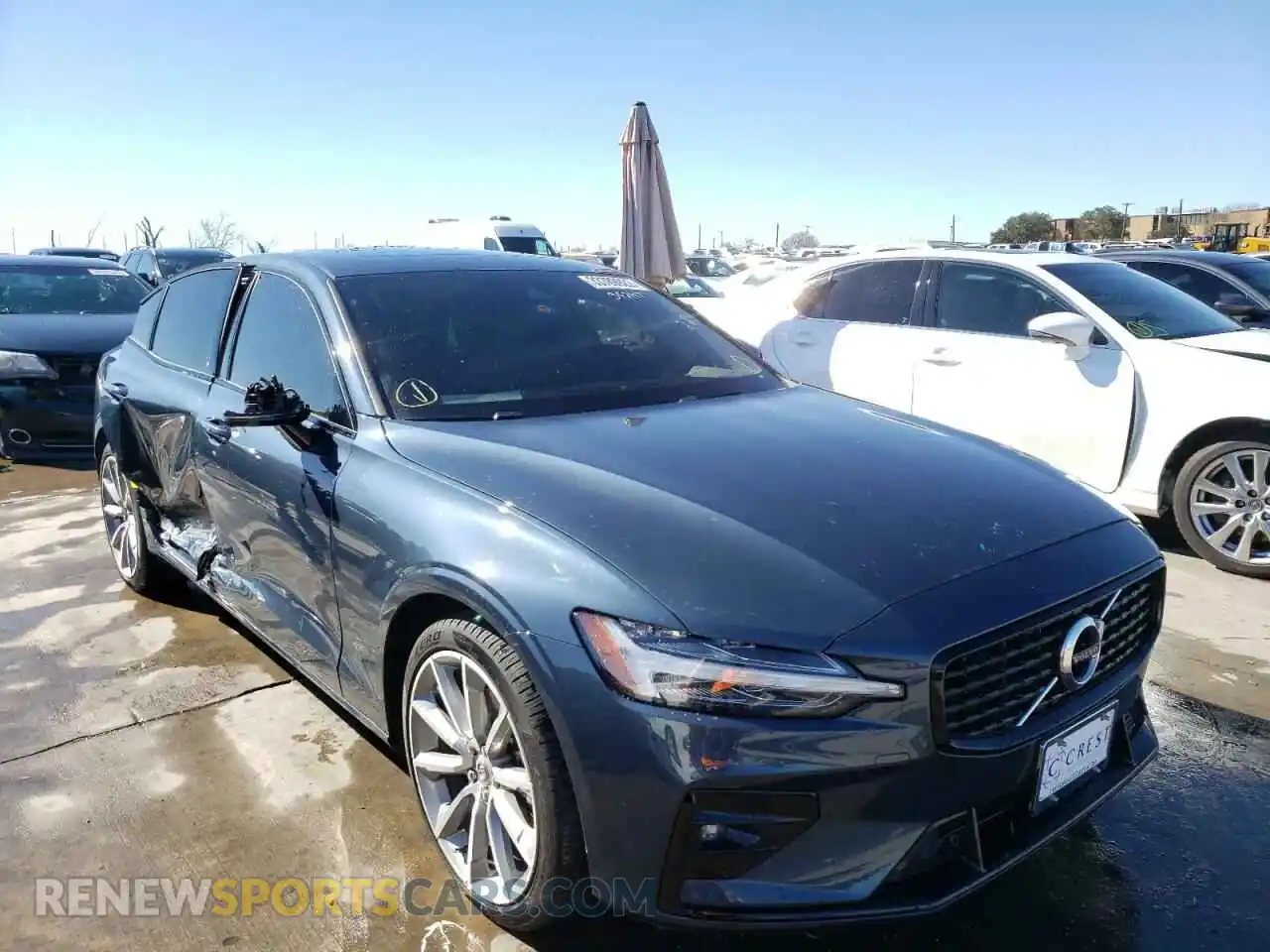 1 Photograph of a damaged car 7JR102TZ1MG103615 VOLVO S60 2021
